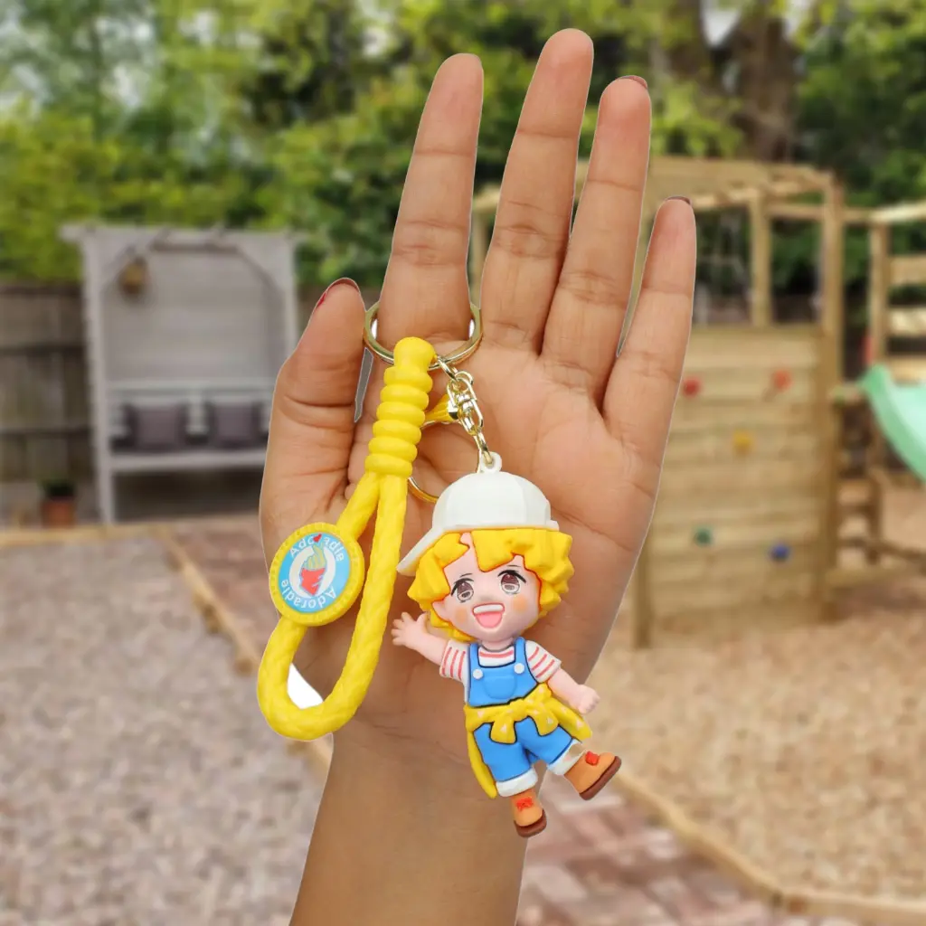Zenistu Demon Slayer Adorable Boy Figure Keychain in Overalls & Cap | Yellow Braided Wrist Strap Accessory | Cute Anime Style Key Ring