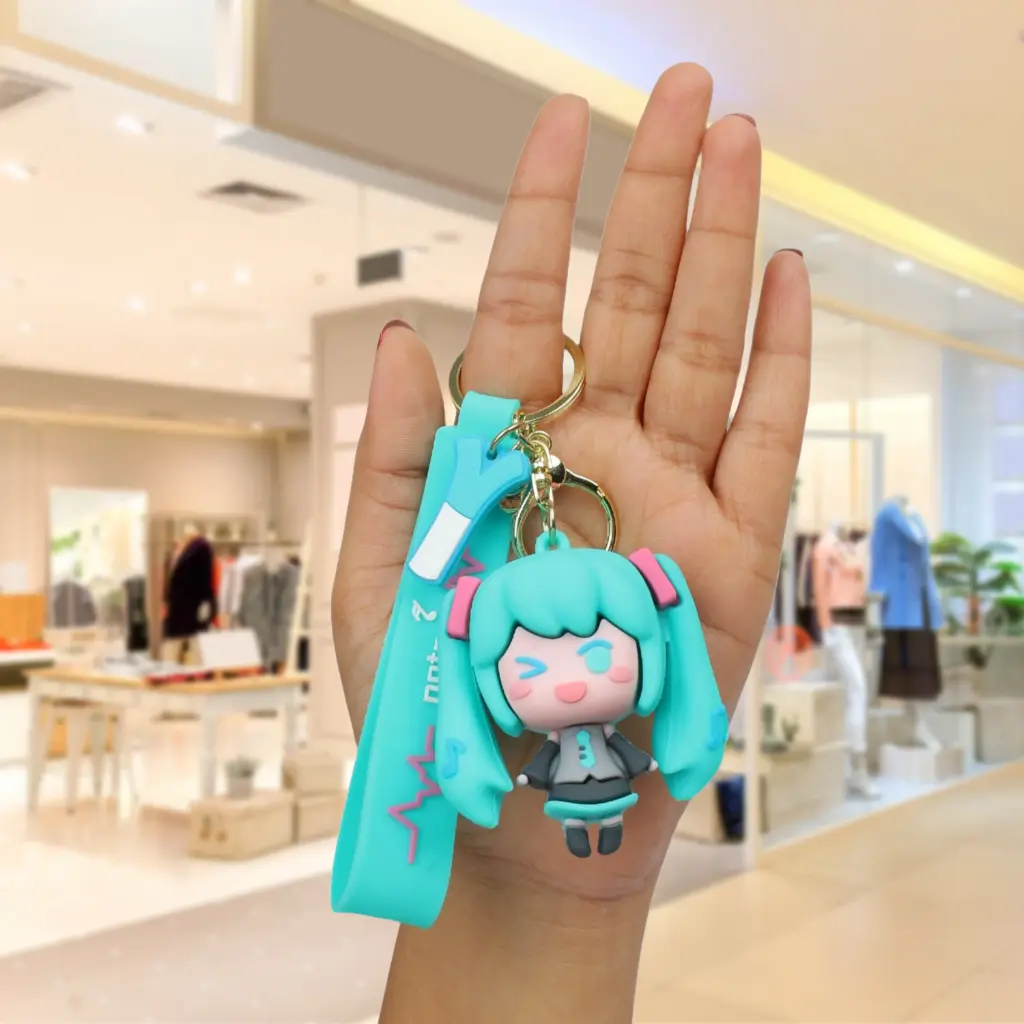 Green fat Hatsune Miku Figure Keychain - Vocaloid Anime Accessory with Turquoise Pigtails | Music Note Logo Strap Key Ring