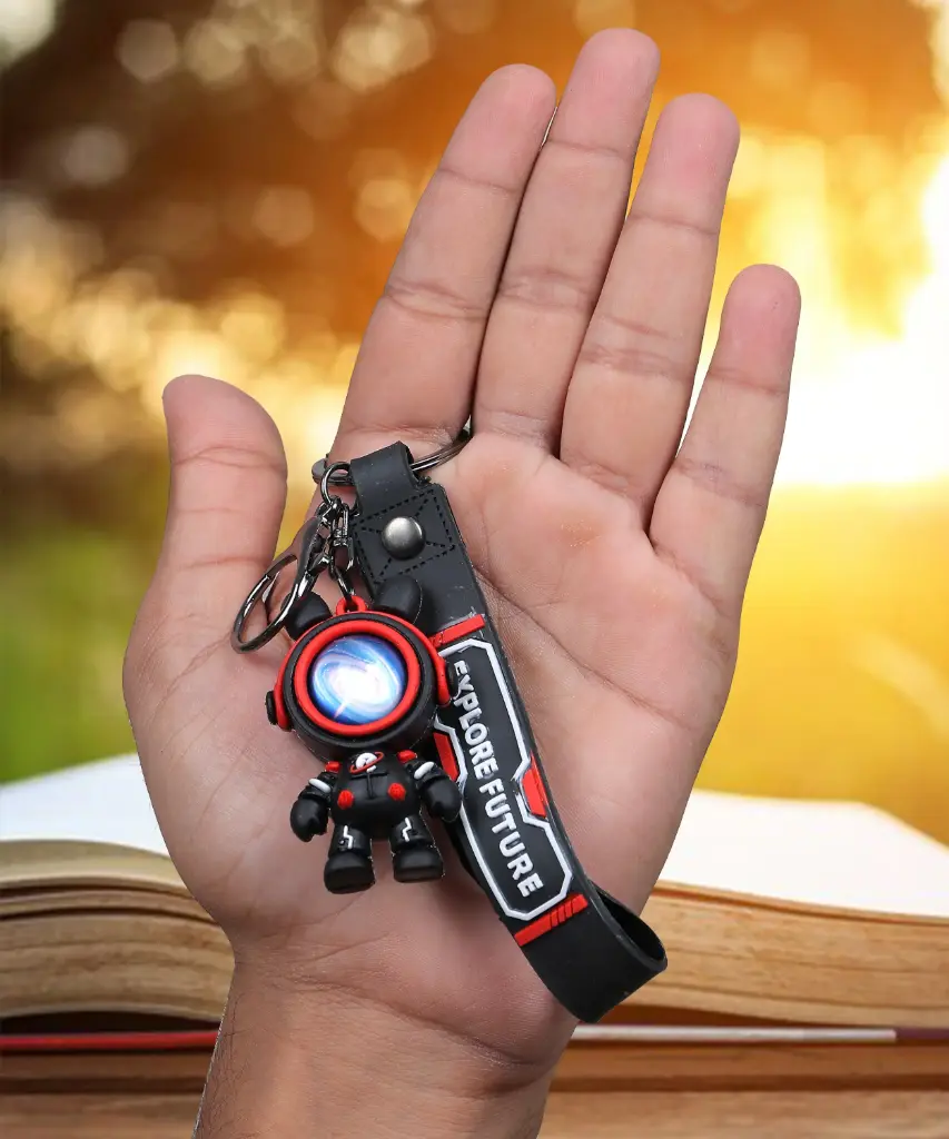 Red Astronaut Space Suit Keychain - Galaxy Helmet Figure with "EXPLORE FUTURE" Logo Strap | Sci-Fi Accessory Key Ring