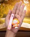 Orange Crybaby Doll Figure Keychain with Yellow Hood | "Crybaby" Logo Wrist Strap Accessory | Trendy Collectible Key Ring