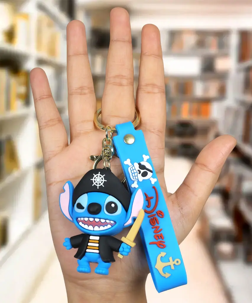 [Stitch pirates 3D keychain] Stitch Pirate Figure Keychain with Sword | Disney Lilo & Stitch Accessory on Blue Logo Strap | Pirates of the Caribbean Style Key Ring